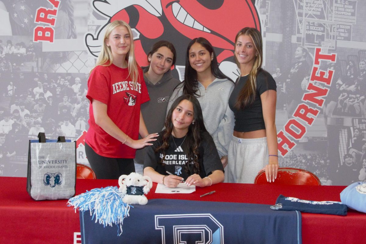 Madison Polce and her friends pose during this week's BHS athletic signing day ceremonies.