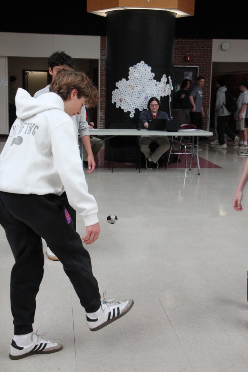 The game of hacky sack takes a lot of fancy footwork.