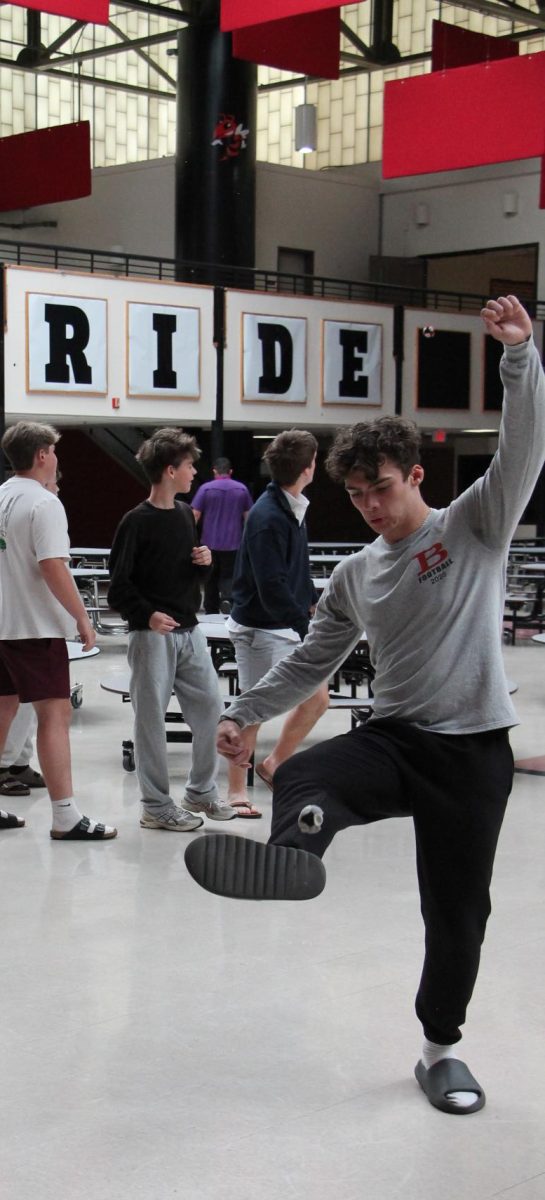 Jorden Devlin '27 practices his footwork during recent footplay in the commons.